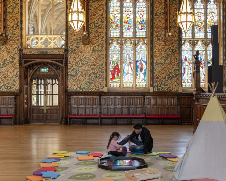 Donald Insall Associates - Rochdale Town Hall, family using the restored Great Hall - photo credit James Newton (1)